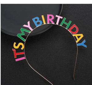 Close-up of rose gold birthday headband with colorful It's My Birthday letters