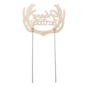 Detailed view of golden antler cake topper with Happy Birthday hollow lettering