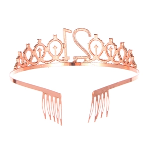 Close-up of rose gold crystal crown headband for 21st birthday with comb design