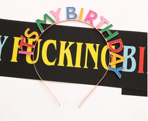 Close-up of rose gold It's My Birthday headband with vibrant colorful lettering
