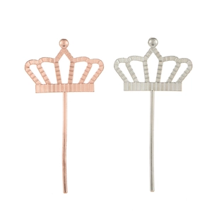 Sparkling metal crown cake toppers in rose gold and silver finishes for birthday decor