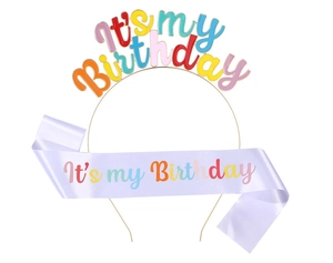 Close-up of golden 'It's my Birthday' headband and purple satin sash set for party girls