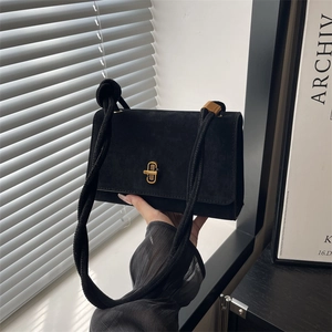 Classic black matte evening clutch with golden twist lock and thick rope shoulder strap