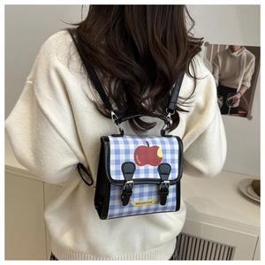 Blue gingham mini backpack featuring a red apple graphic and black faux leather straps