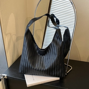 Large black woven hobo tote bag with V-pattern texture for women's stylish daily commute
