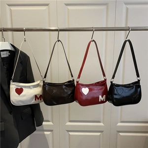 Minimalist solid color crescent hobo bags in white brown red black with metal M detail
