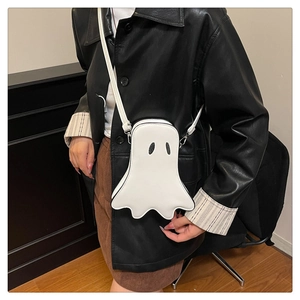 Detailed view of the white ghost shaped crossbody bag with smooth PU leather and zip closure
