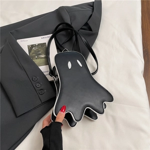 Cute black ghost-shaped crossbody bag made of PU leather with silver sequin eye details