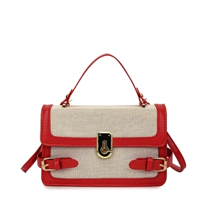 Chic color-block handbag in red leather and beige woven fabric with gold buckle