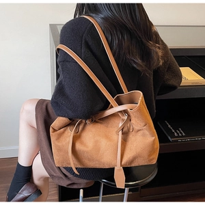 Vintage brown suede tote bag for women showing large capacity and soft texture details