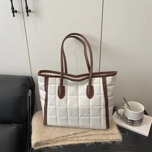 Quilted large tote bag in cream white with brown leather trim and grid pattern
