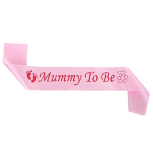 Pink satin Mommy To Be sash with teddy bear and footprints for baby shower party decoration