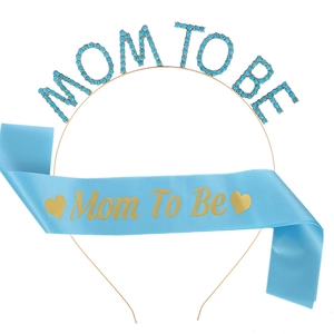 Detail of Mom To Be set with sky blue satin sash and gold rhinestone headband