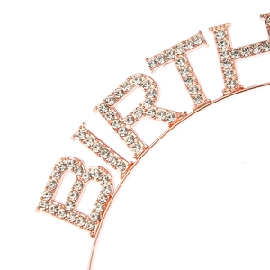 Detailed close-up of rose gold birthday girl headband with sparkling rhinestones
