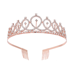 Detail showing rose gold rhinestone birthday crown with comb attachments on white background