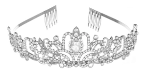 Detailed front view of a silver crystal tiara with pear-shaped stone and side combs