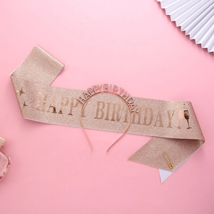 Rose gold birthday party set with glitter sash, rhinestone headband, and decorative pin