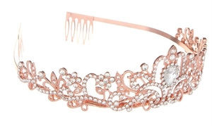 Detail of rose gold crystal crown with intricate floral openwork and side combs for secure fit