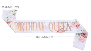 Detail showing white satin Birthday Queen sash with floral print and size 160x9.5cm