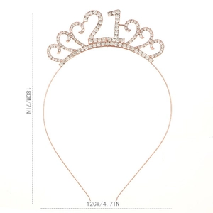 Detailed view of rose gold 21st birthday tiara with white rhinestones and heart design