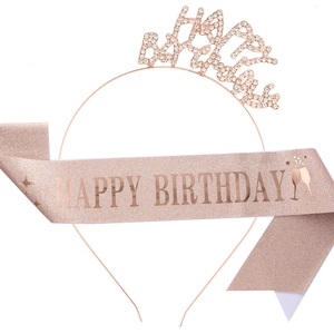 Close-up of rose gold Happy Birthday rhinestone headband and glitter sash set