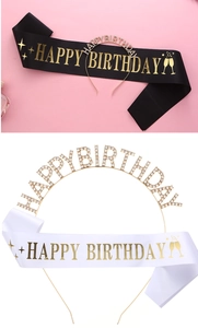 Detail of Happy Birthday rhinestone headband and gold stamped satin sash for party
