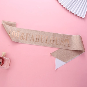 Rose gold glitter sash with 100 & Fabulous text for 100th birthday party celebrations