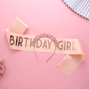 Birthday Girl rose gold glitter sash and rhinestone tiara set on pink background
