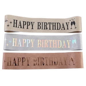 Detailed view of Happy Birthday sashes in gold silver and rose gold glitter fabric