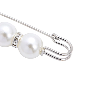 Classic elegant silver pearl brooch pin with sparkling rhinestones for women on white background