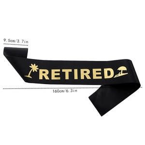 Close-up of black satin Retired sash with gold foil lettering and summer motifs