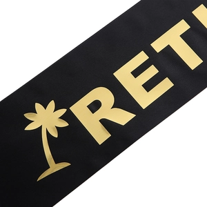 Elegant black satin retired sash with gold foil lettering and palm tree design for parties