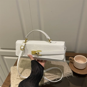 Elegant white crocodile embossed leather handbag with gold metal lock and shoulder strap