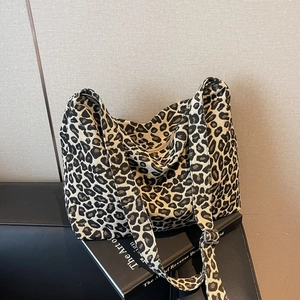 Leopard print shoulder bag with adjustable strap and silver buckle for casual daily wear
