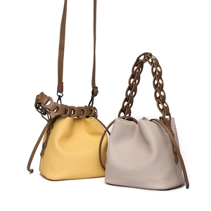 Modern woven leather bucket bags in yellow and grey with chain straps and lychee texture