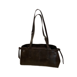 Retro dark brown leather tote bag with long shoulder straps and drawstring side details
