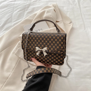 Retro brown monogram crossbody bag with silver metal bow and stylish chain strap