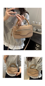 Détails du rabat à motif crocodile et fermeture éclair sur sac à main couleur kaki