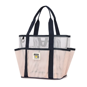 Mesh beach bag with pockets and Been Love logo for travel and swimwear storage