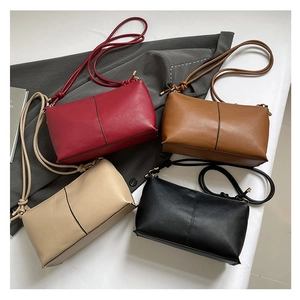 Large minimalist leather tote bags in red, brown, beige and black with top handles