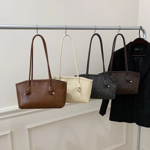 Minimalist large-capacity vintage tote bags in four neutral colors on display