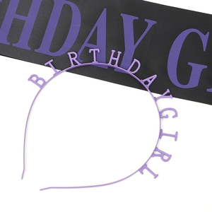 Macro view of purple Birthday Girl headband and sash set for birthday party decorations