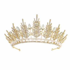 Detailed view of silver plated baroque crown with white rhinestones and pearls for weddings