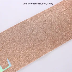 Detailed macro view of soft glittery rose gold birthday sash fabric with shiny texture