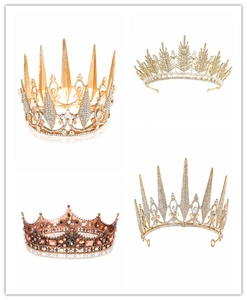 Macro view of four baroque silver-plated tiaras with white zircons and crystals