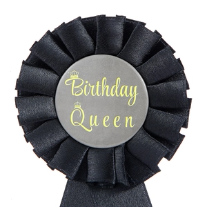 Elegant black Birthday Queen ribbon badge with gold lettering and crown for party decor