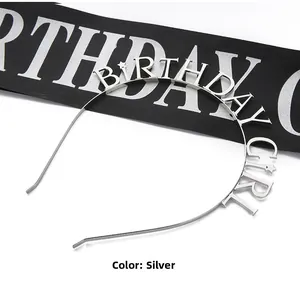 Detailed view of a silver Birthday Girl metal headband with glitter star ornaments