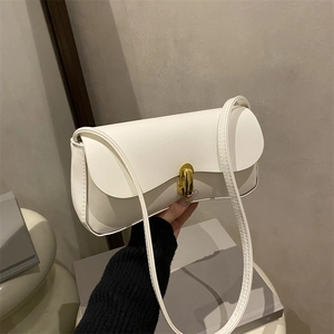 Minimalist white leather underarm bag with gold cylindrical twist lock for women
