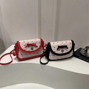Chic 2025 women's crossbody bags with floral patterns and delicate bow accents