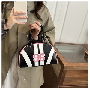 Detail of Boston bowling bag with pink 96 number and stylish side stripe texture